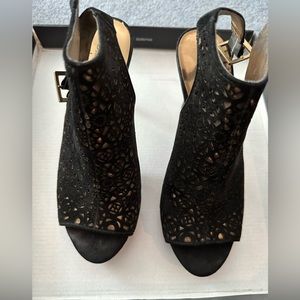 Carlos Santana Black and Gold Heels